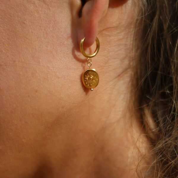 boucles anneau soleil dore acier
