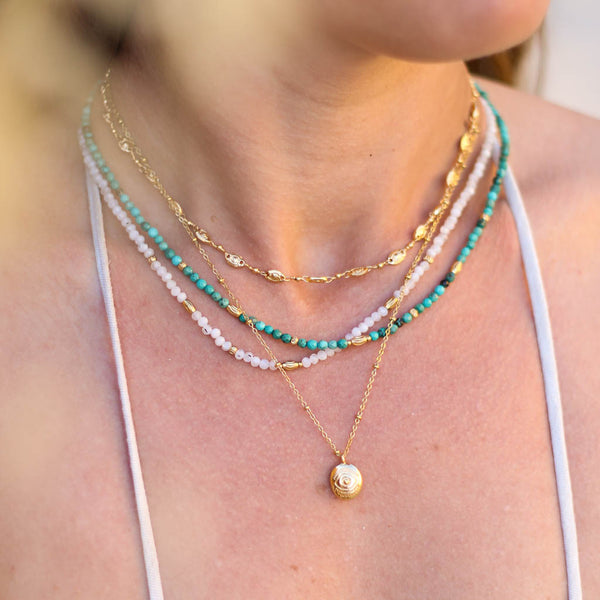 collier mini oeil dore createur acier