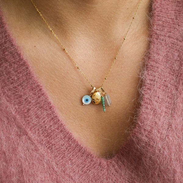 collier soleil œil vert labradorite tendance