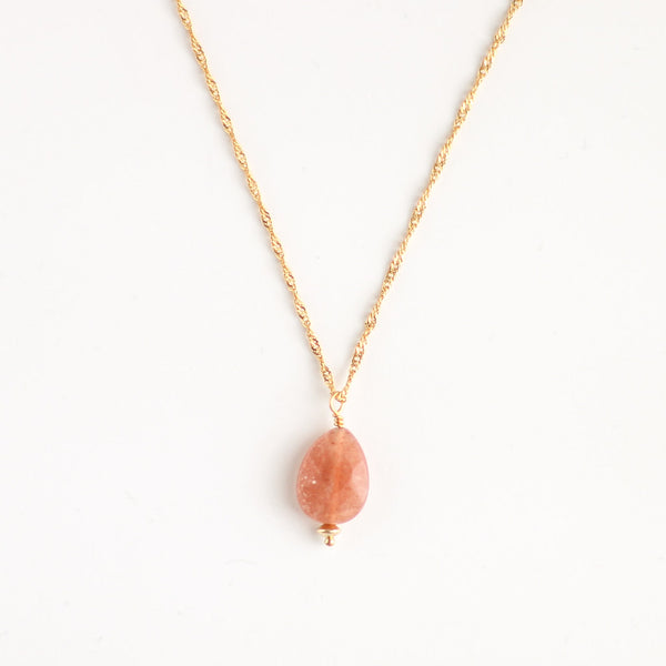 collier pierre de soleil doré face