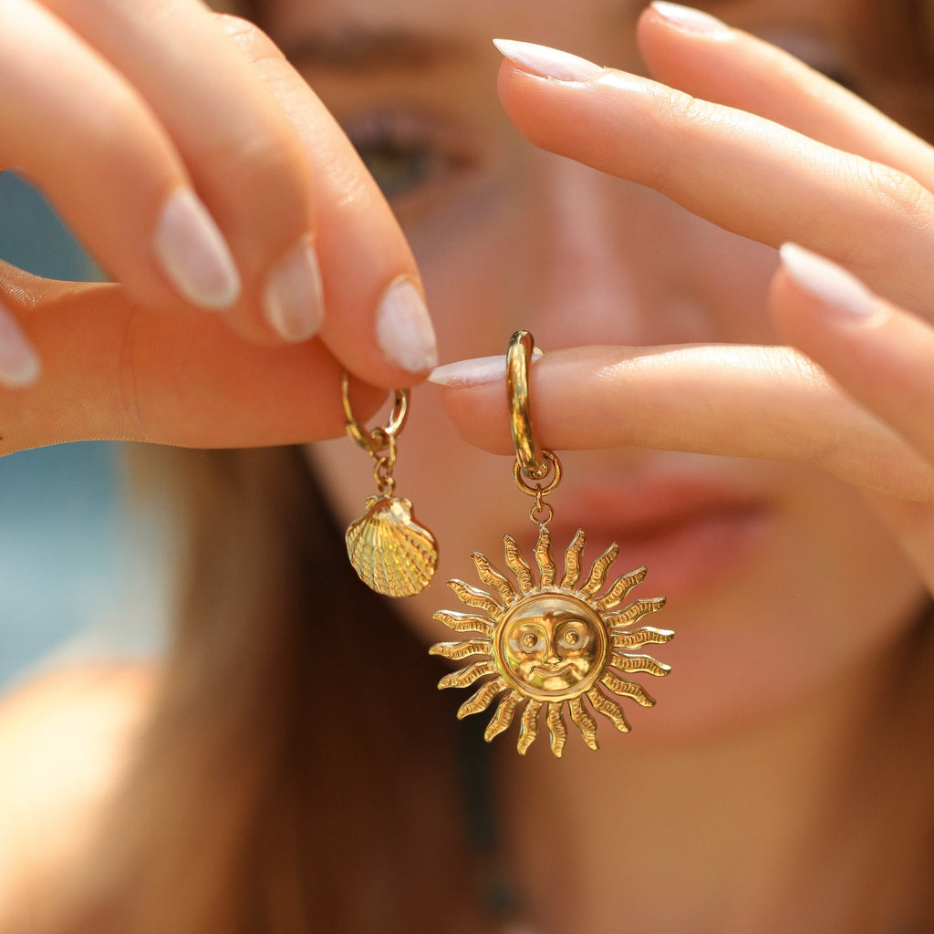 boucle oreille anneau coquillage acier création