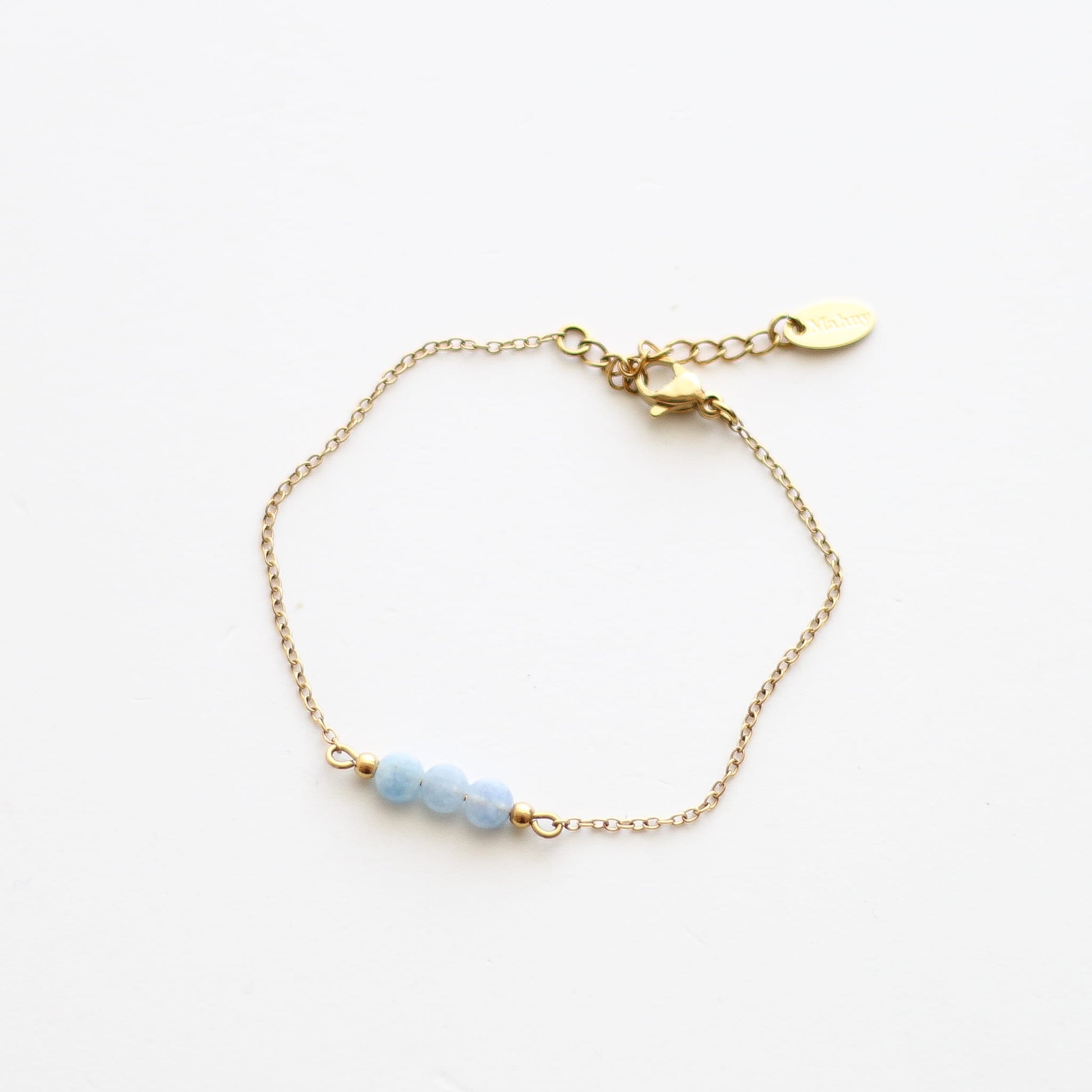 Bracelet en aigue-marine sur chaîne acier inoxydable.