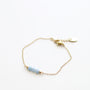 Bracelet en aigue-marine sur chaîne acier inoxydable.