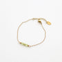 Bracelet en péridot vert sur chaîne acier inoxydable.