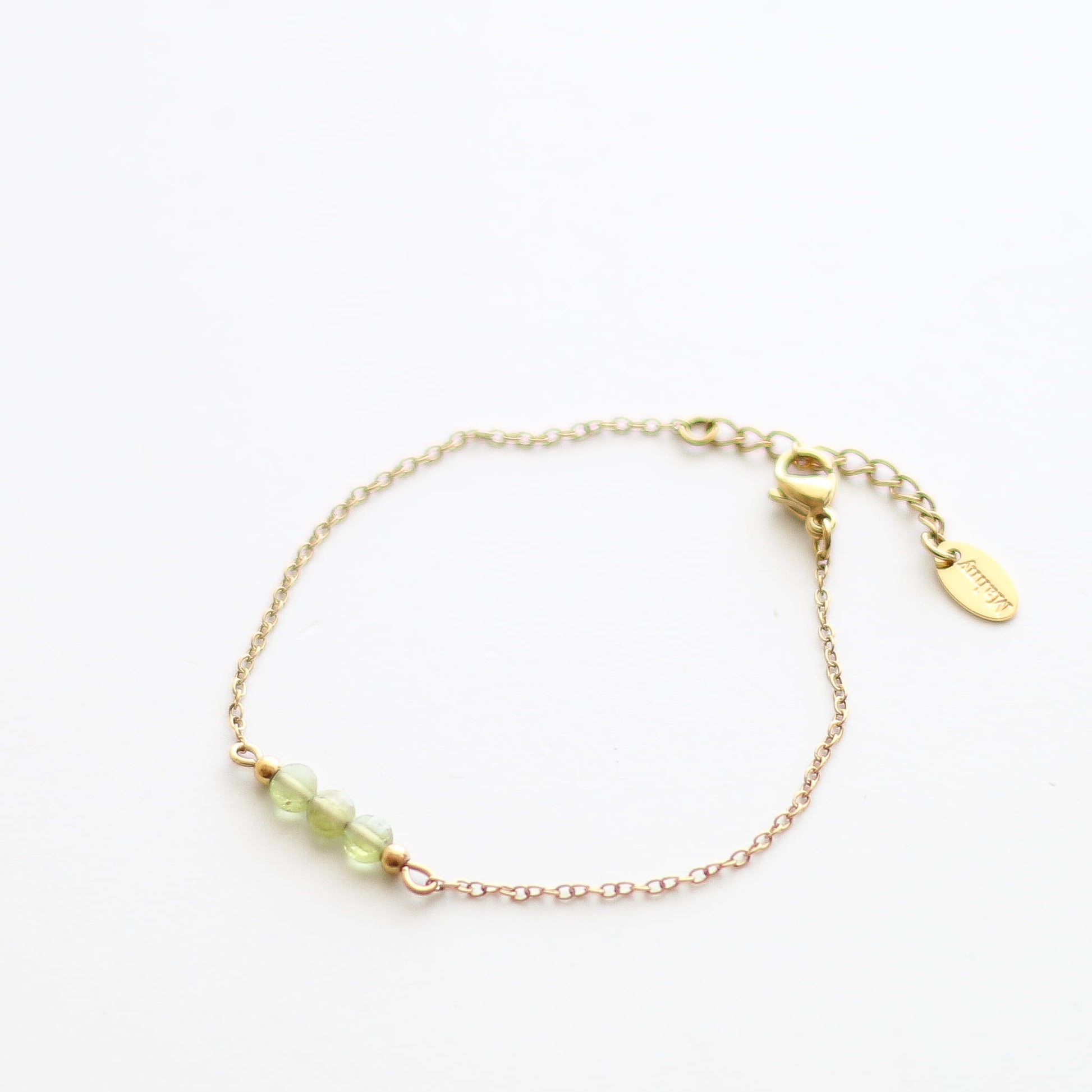 Bracelet en péridot vert sur chaîne acier inoxydable.