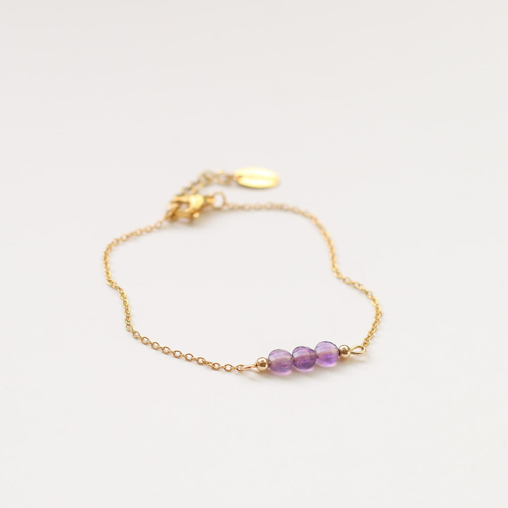 bracelet perle acier améthyste doré