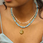Collier en aragonite bleue sur chaîne acier inoxydable.