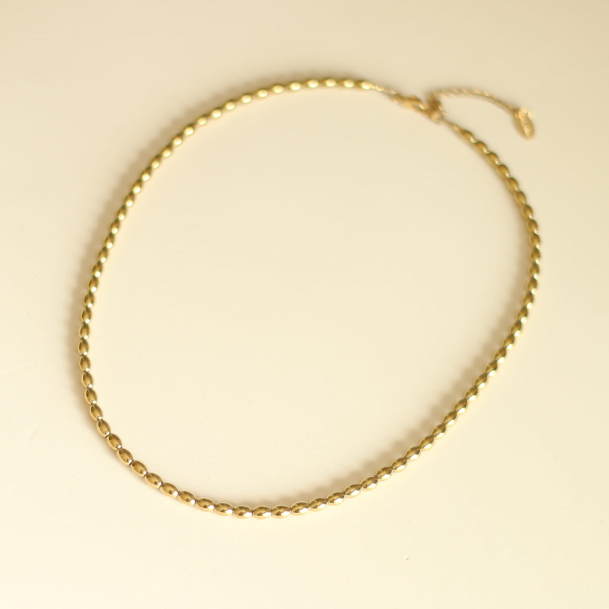 Collier Hématite dorée tonneau