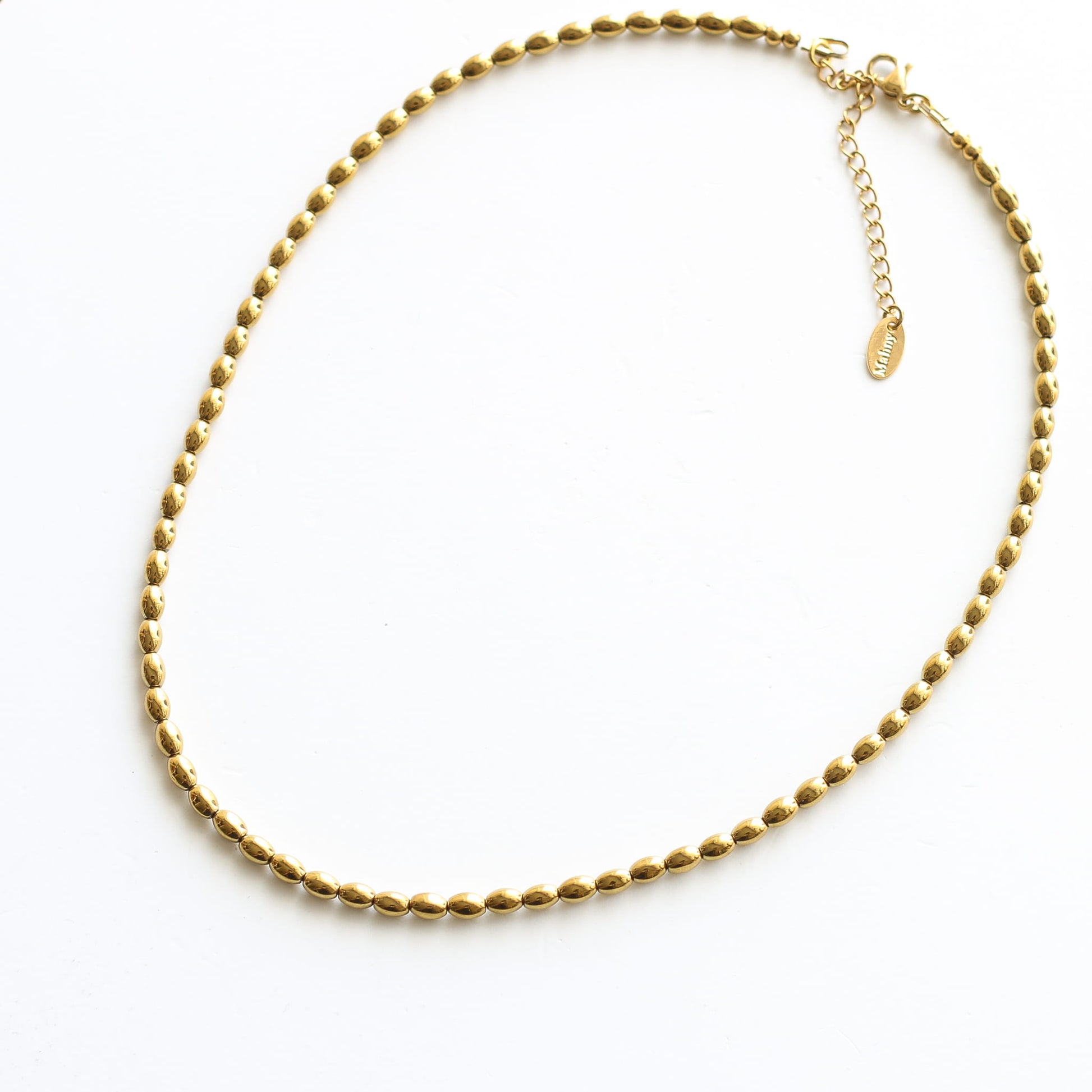 Collier Hématite dorée, détail du fermoir signé Mahny, collection Lazuli, pierres naturelles.