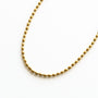 Collier Hématite dorée, vue de profil, Mahny bijoux pierre fine.