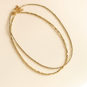 Collier fin en perles d'Hématite facettée 