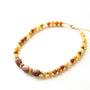 Collier Sunshine Jade Jaune, gros plan sur la pierre, pierre véritable, signé Mahny.