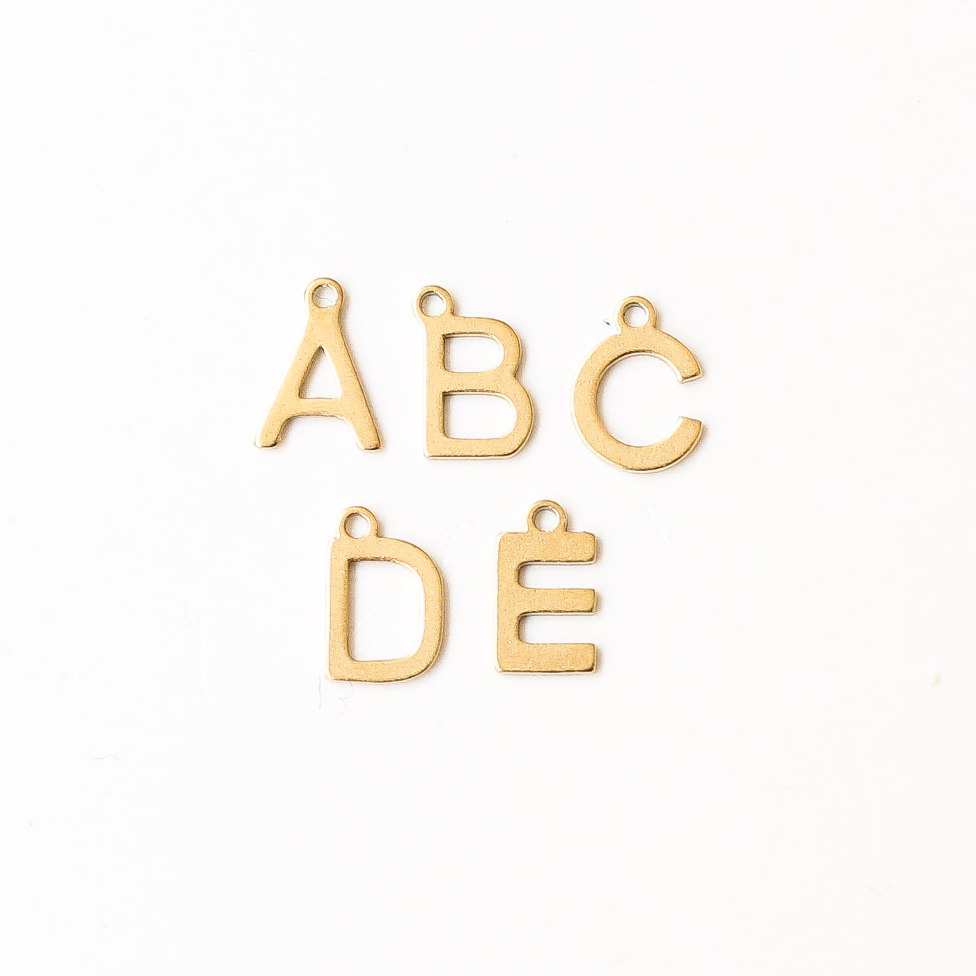 pendentif charm's acier inoxydable lettre
