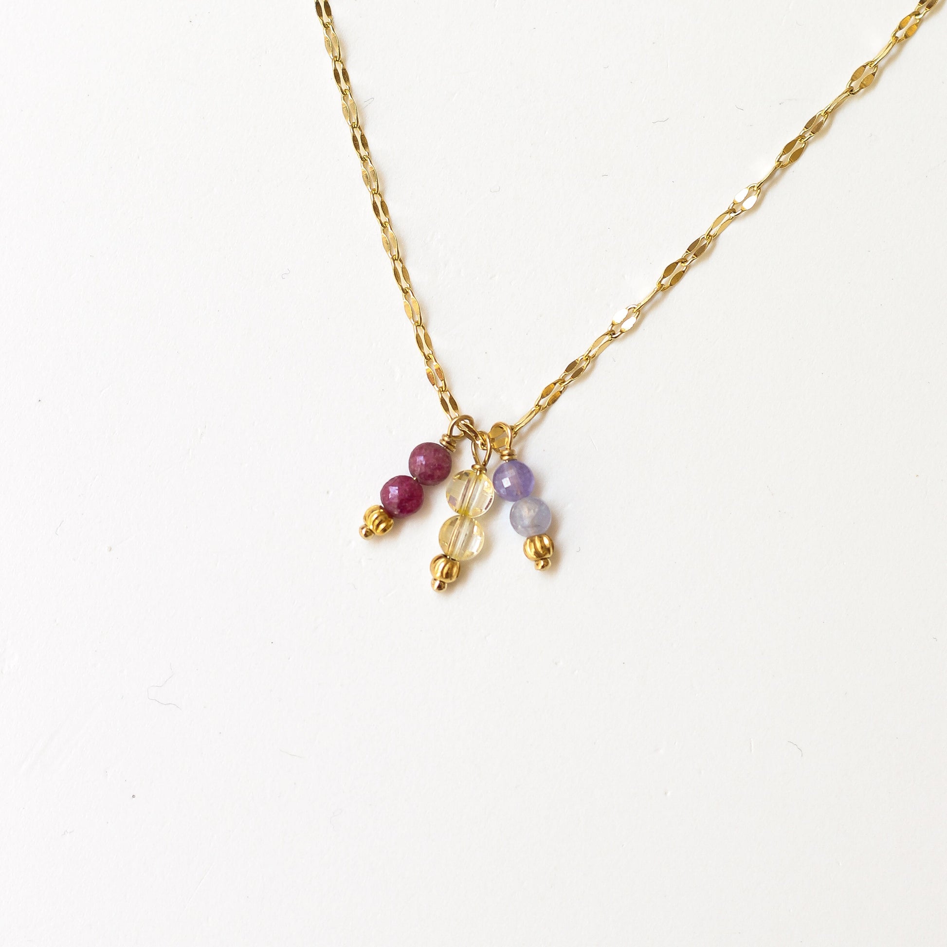 perle de naissance rubis citrine tanzanite