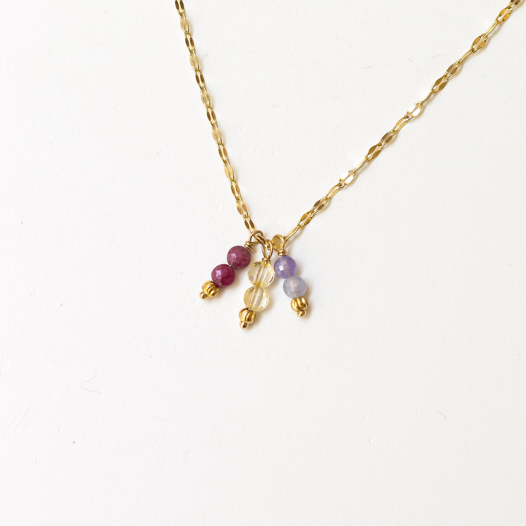 perle de naissance rubis citrine tanzanite