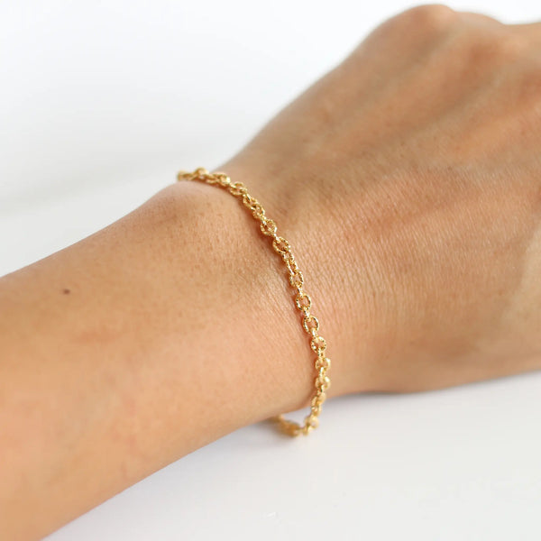 bracelet créateur doré scintillant porté