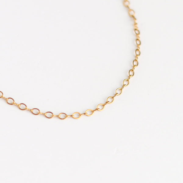 collier doré aventurine créateur chaîne